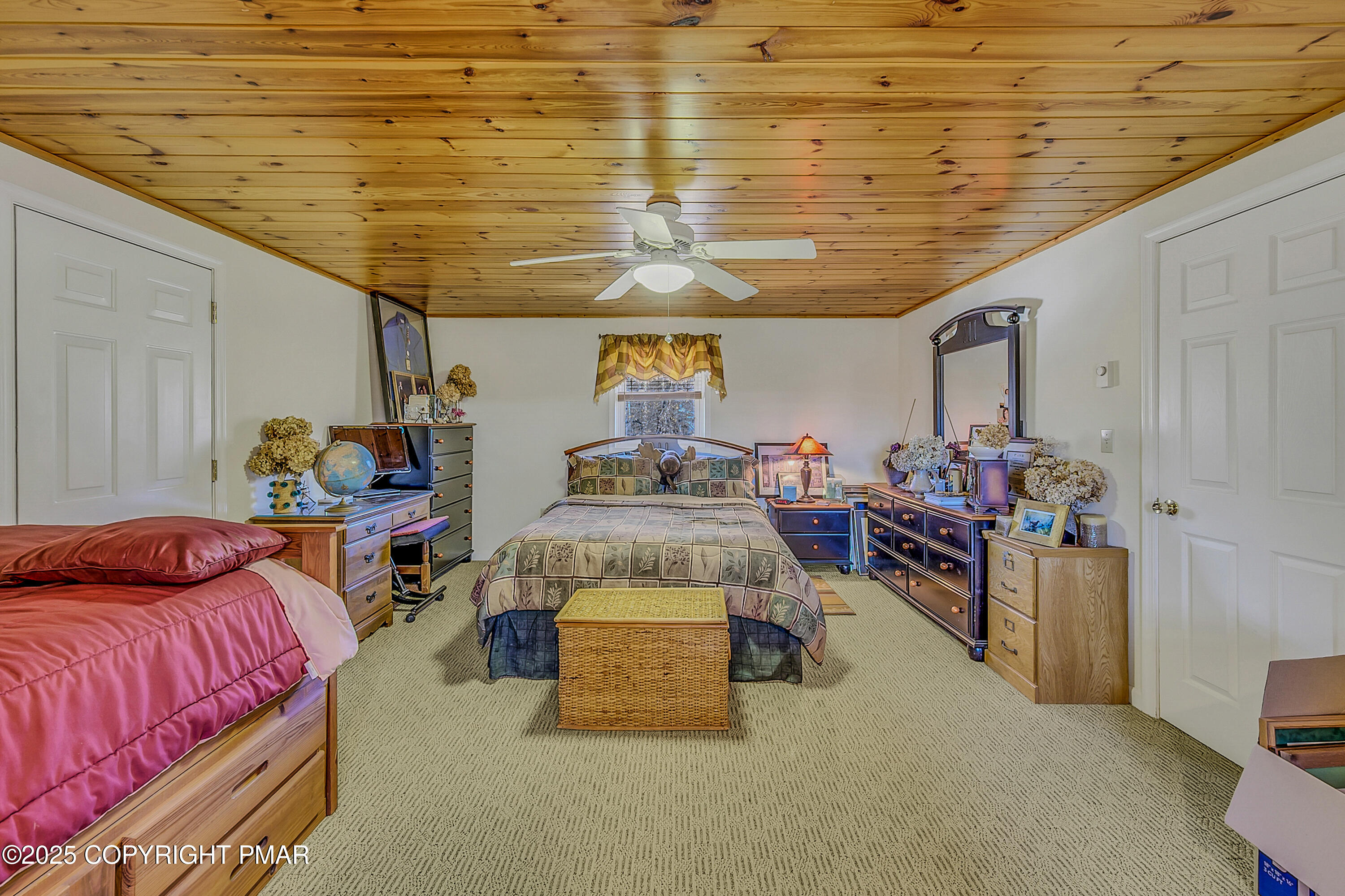 1451 Long Pond Road Long Pond, PA 18334 - Photo 59 of 82 a bed room with a bed and a couch