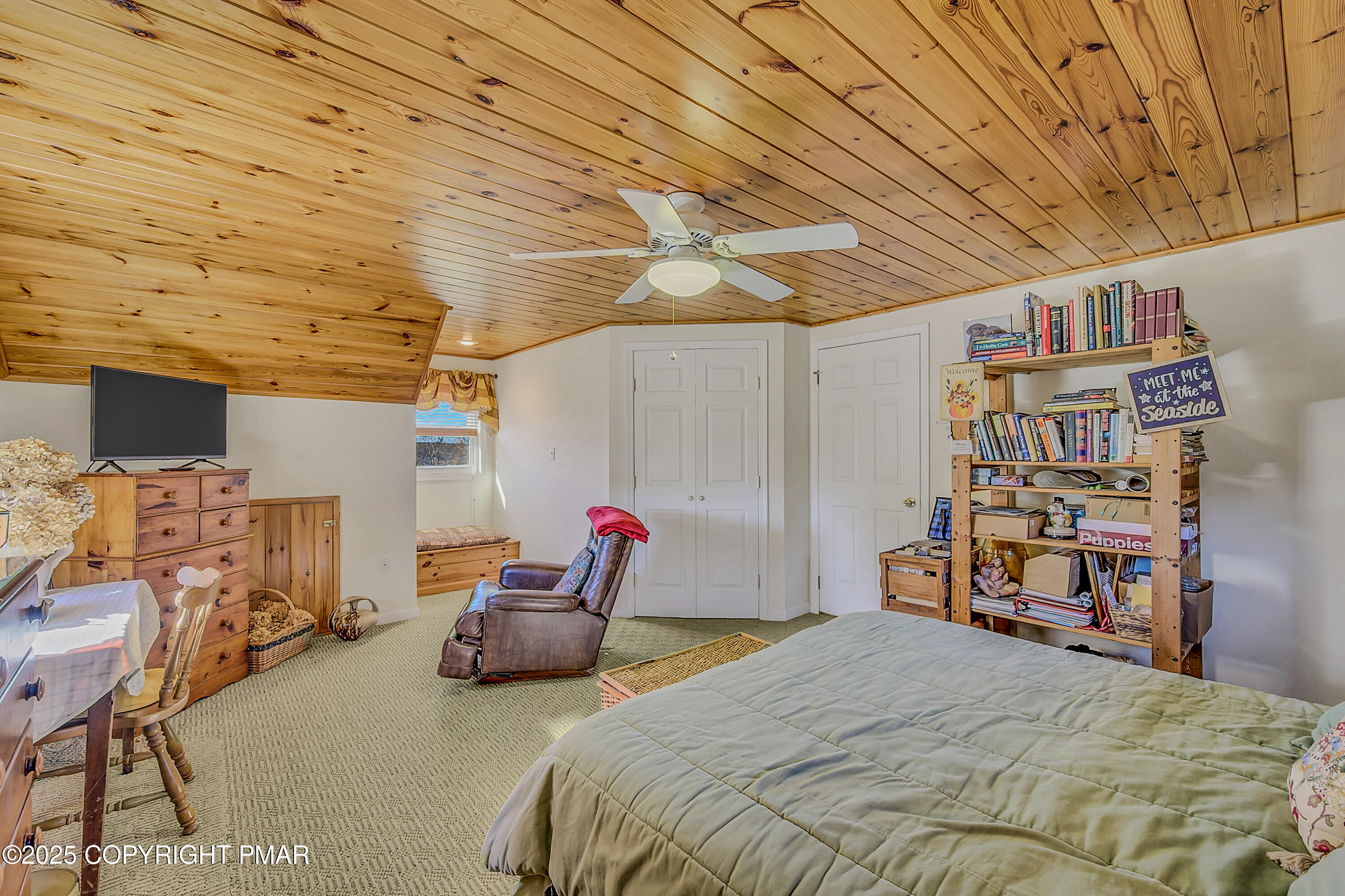 1451 Long Pond Road Long Pond, PA 18334 - Photo 65 of 82 a bedroom with a bed a desk and chair with the wooden floor