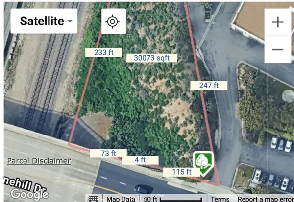 a view of a backyard with plants