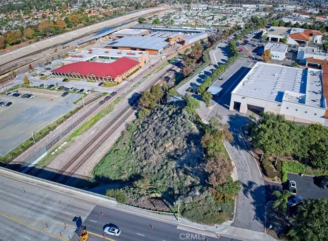 a view of a backyard with sitting area