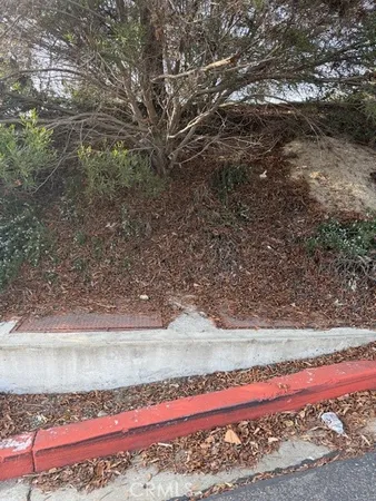a view of swimming pool from a balcony