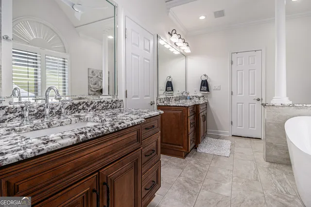 a view of living room kitchen with granite countertop furniture and fireplace