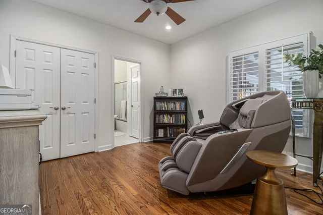 a view of a livingroom with furniture and wooden floor