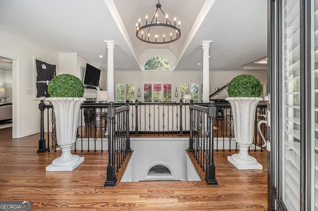 a view of living room and wooden floor