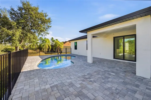 a view of a house with a small yard