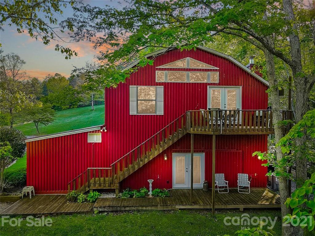 3271 Polk County Line Road Rutherfordton, NC 28139 - Photo 46 of 48 a front view of a house with garden