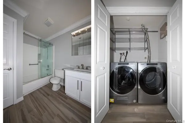 a view of a bedroom with washer and dryer