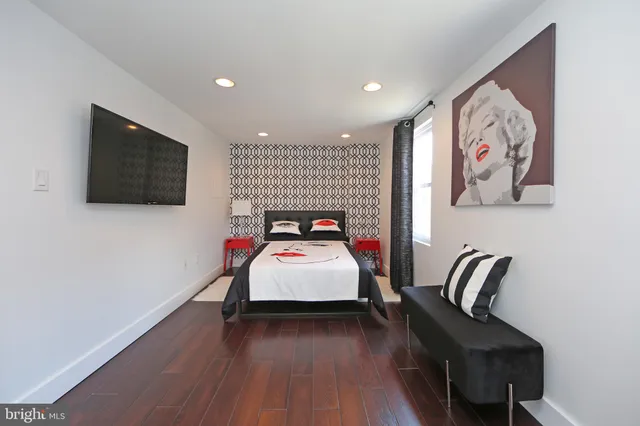 a living room with furniture and window