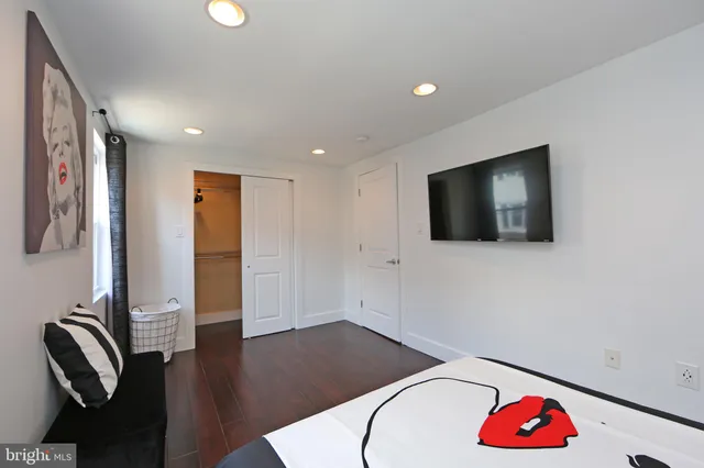 a bathroom with a shower and a sink