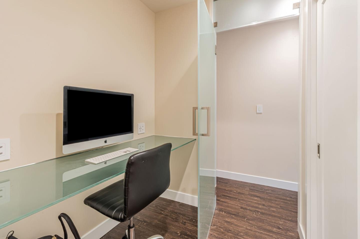 321 Vineyard Drive San Jose, CA 95119 - Photo 19 of 29 a room with a flat screen tv and cabinets