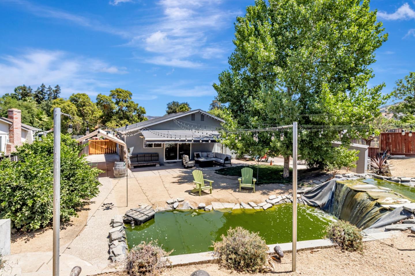 321 Vineyard Drive San Jose, CA 95119 - Photo 29 of 29 a front view of a house with swimming pool garden and patio