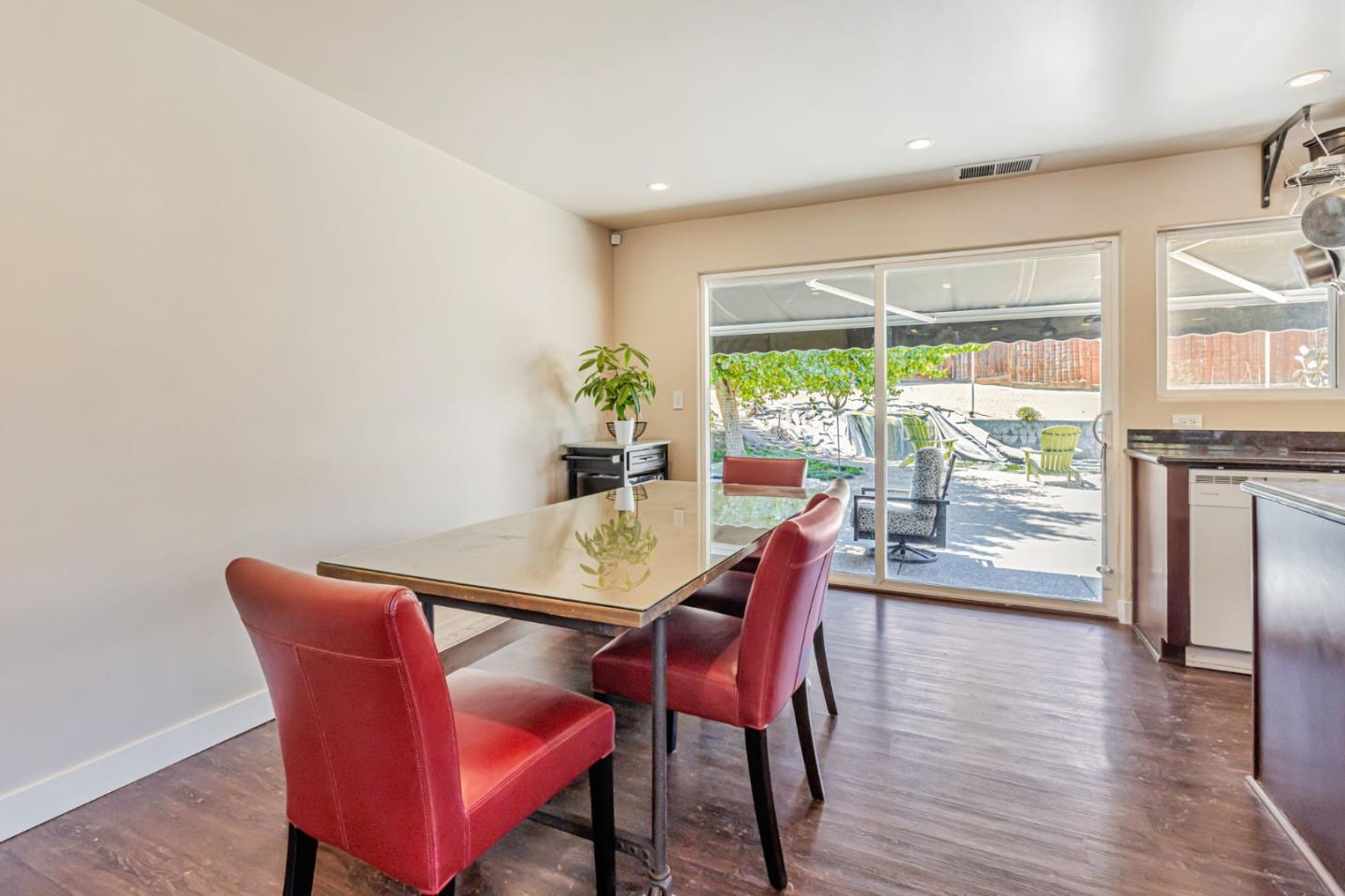 321 Vineyard Drive San Jose, CA 95119 - Photo 9 of 29 a view of a dining room with furniture window and wooden floor