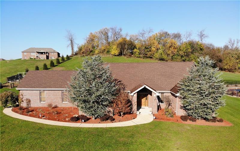 240 Durst Road Irwin, PA 15642 - Photo 1 of 24 Welcome to 240 Durst Road! This all brick beauty is situated on 2.5 acres. Bordered by mature trees in rear. Filled with lovely landscaping and fruit trees. Magnificent views.