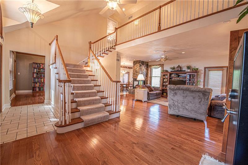 240 Durst Road Irwin, PA 15642 - Photo 4 of 24 Open foyer w/vaulted ceilings & ceramic floors. Open 2nd floor balcony leads to Bedrooms 3 & 4.
