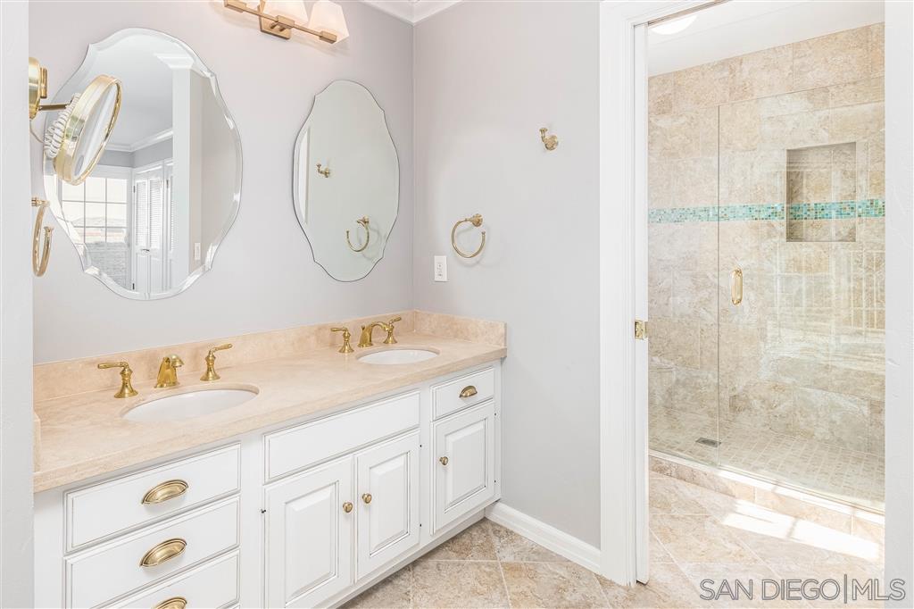 862 Prospect Street, Unit 1 La Jolla, CA 92037 - Photo 15 of 25 a spacious bathroom with a double vanity sink mirror and
