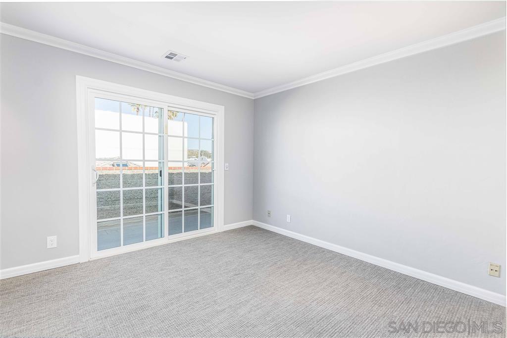 862 Prospect Street, Unit 1 La Jolla, CA 92037 - Photo 16 of 25 an empty room with windows