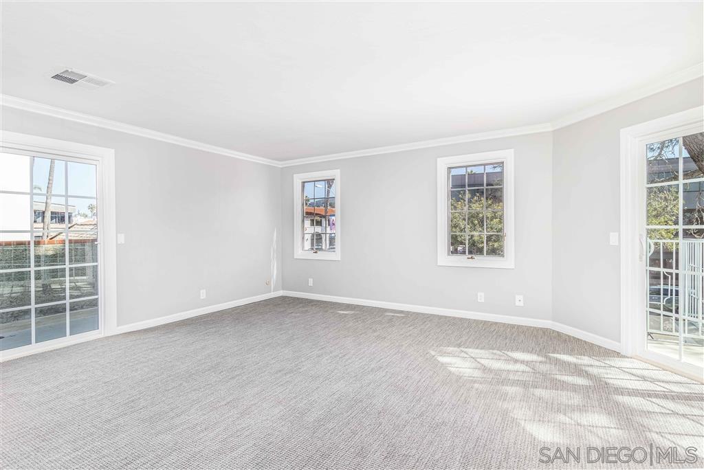862 Prospect Street, Unit 1 La Jolla, CA 92037 - Photo 18 of 25 an empty room with windows