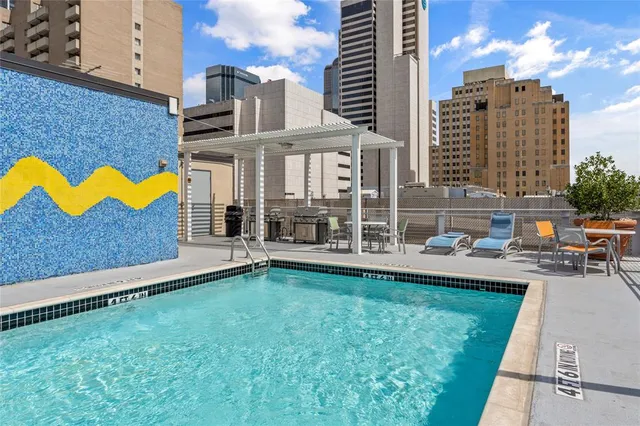 a view of a house with a swimming pool