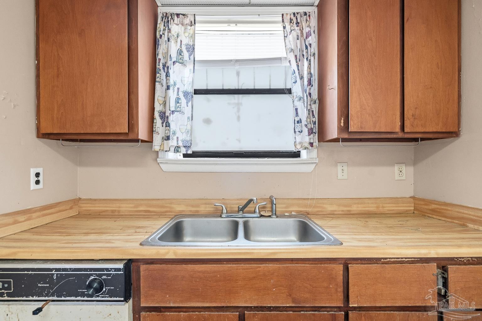 1920 North Spring Street Pensacola, FL 32501 - Photo 19 of 43 a close view of sink and cabinets