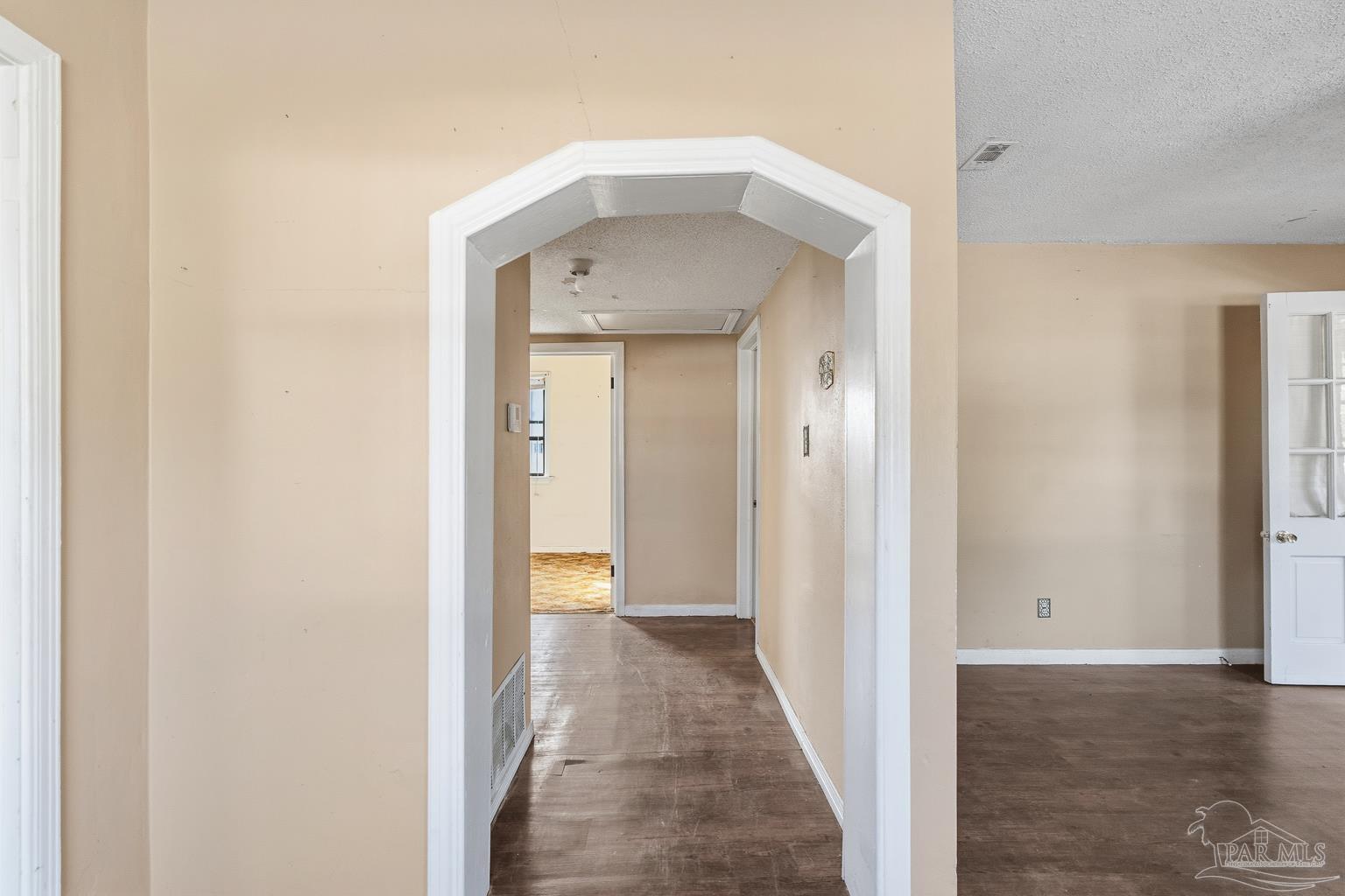 1920 North Spring Street Pensacola, FL 32501 - Photo 23 of 43 a view of a hallway with wooden floor