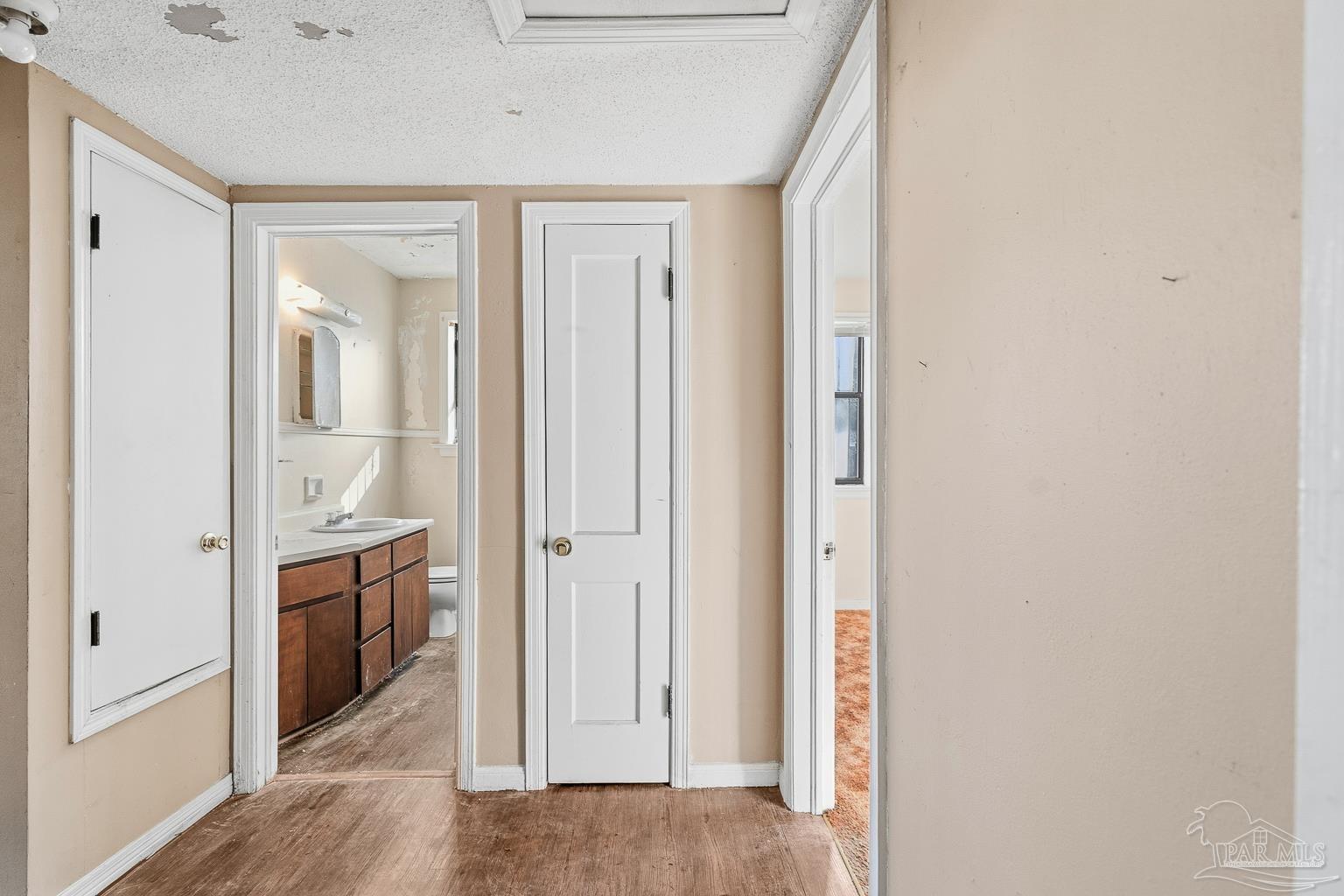 1920 North Spring Street Pensacola, FL 32501 - Photo 26 of 43 a view of a hallway with wooden floor and cabinets