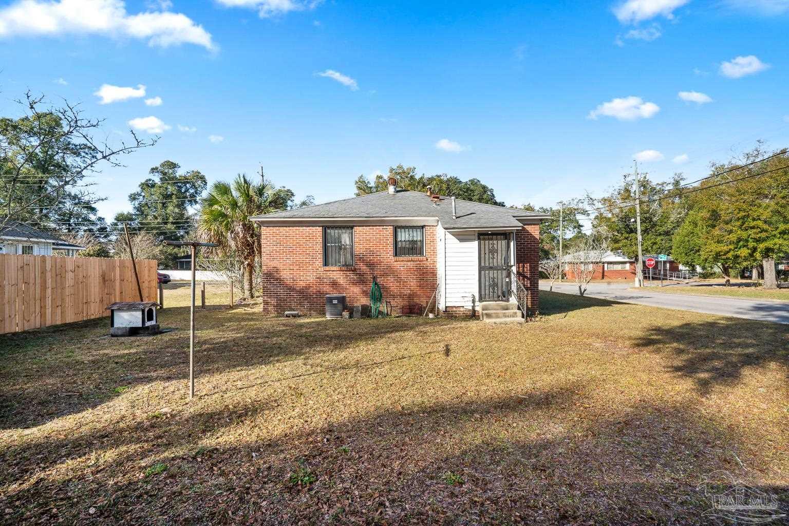 1920 North Spring Street Pensacola, FL 32501 - Photo 40 of 43 a view of a house with a yard and tree s