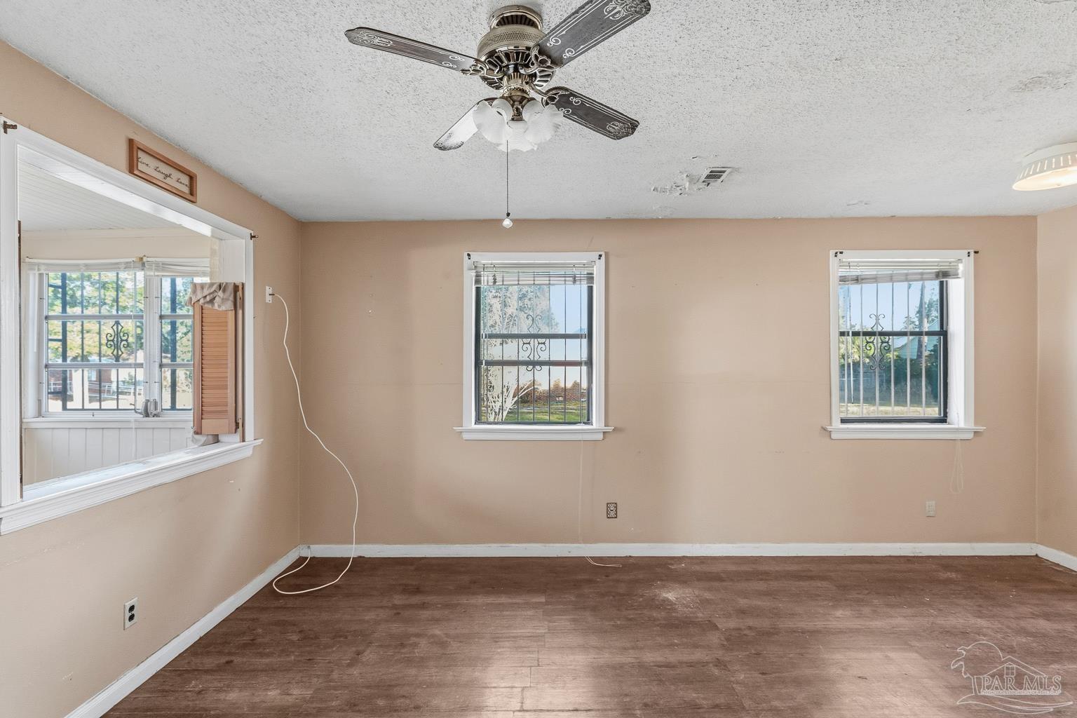 1920 North Spring Street Pensacola, FL 32501 - Photo 10 of 43 a view of an empty room with a window