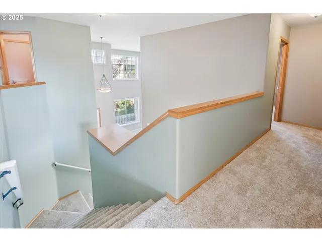 a spacious bedroom with a bed and window