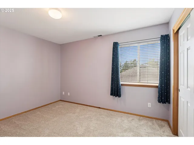 a bathroom with a sink toilet a mirror and vanity