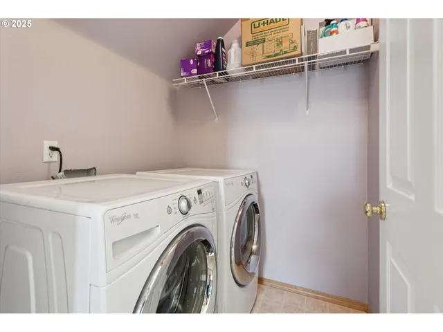 a view of balcony with wooden floor and yard