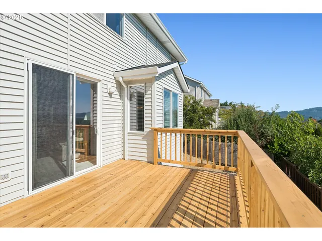 a view of a backyard of the house