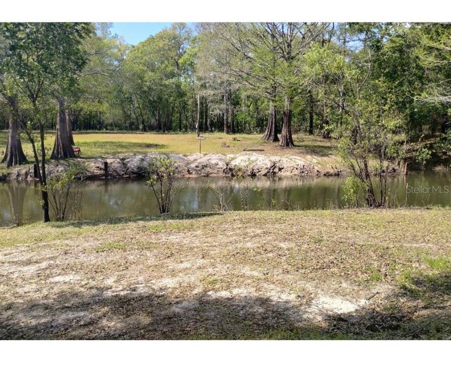 3237 Tiger Street Dade City, FL 33523 - Photo 3 of 6 a view of a lake view