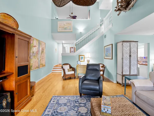 a living room with furniture and a rug