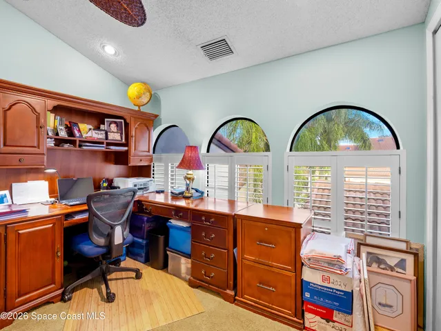 a view of hall way with furniture and toys
