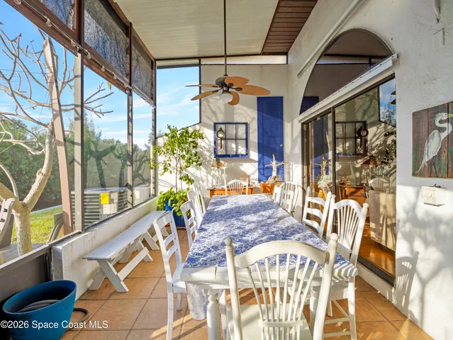 a view of an dining room with furniture window and outside view