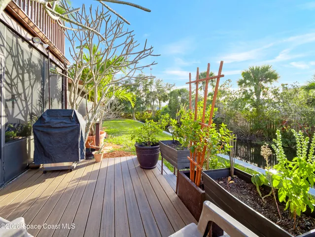 a view of a chairs setting in a backyard