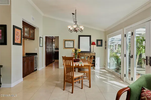 a large kitchen with stainless steel appliances granite countertop a large counter top and a stove