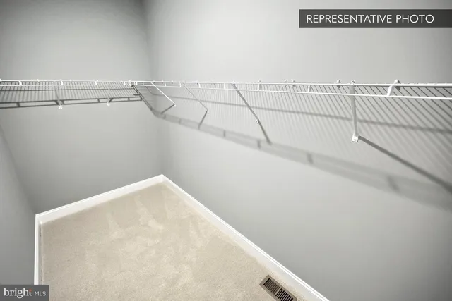 a view of small space with racks on the wall