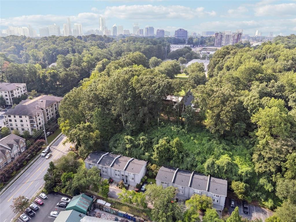 4010 Roswell Road Northeast, Unit A2 Atlanta, GA 30342 - Photo 25 of 32 an aerial view of a house with a yard