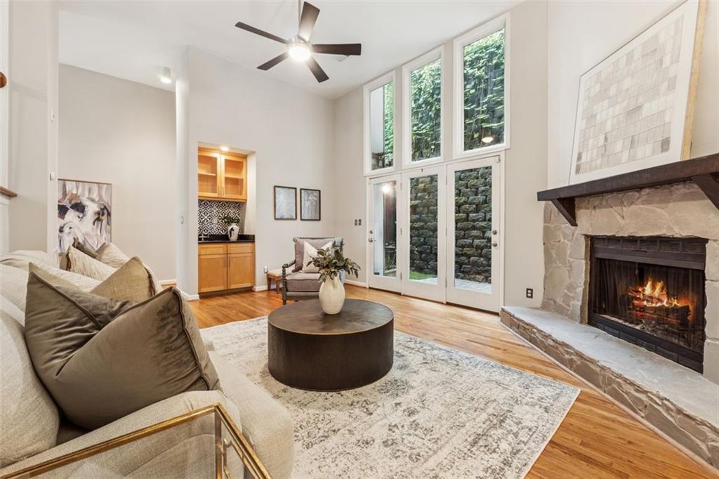 4010 Roswell Road Northeast, Unit A2 Atlanta, GA 30342 - Photo 6 of 32 a living room with furniture and a fireplace