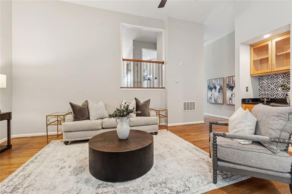 4010 Roswell Road Northeast, Unit A2 Atlanta, GA 30342 - Photo 7 of 32 a living room with furniture and a rug