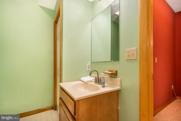 a view of an empty room with a door