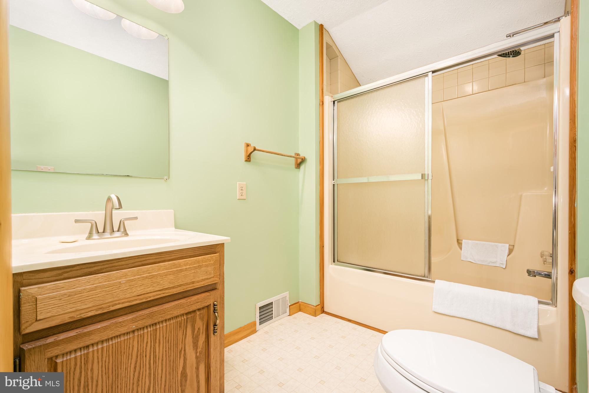 60 Barbaras Way McHenry, MD 21541 - Photo 40 of 51 a bathroom with a sink toilet and shower
