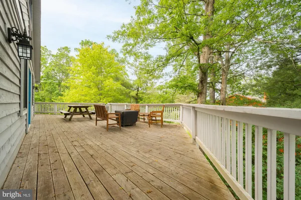 a view of a balcony with chairs