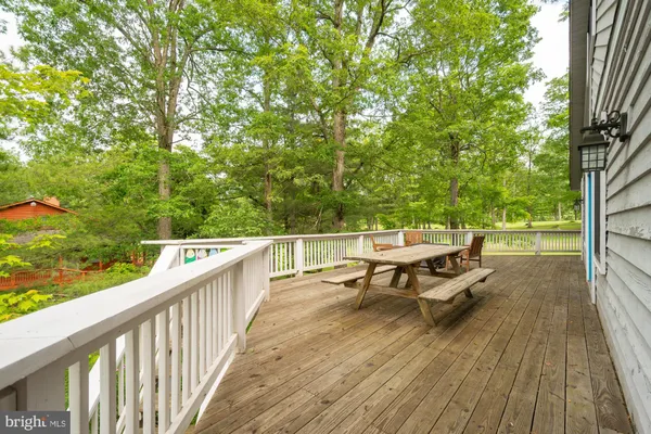 a view of balcony with furniture