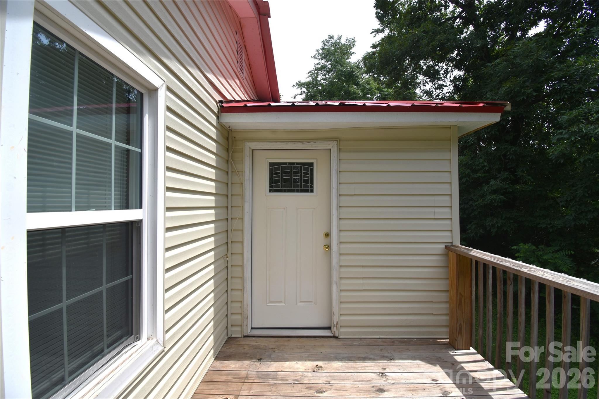 622 Green St Loop Marion, NC 28752 - Photo 16 of 16 a view of a house with a wooden fence