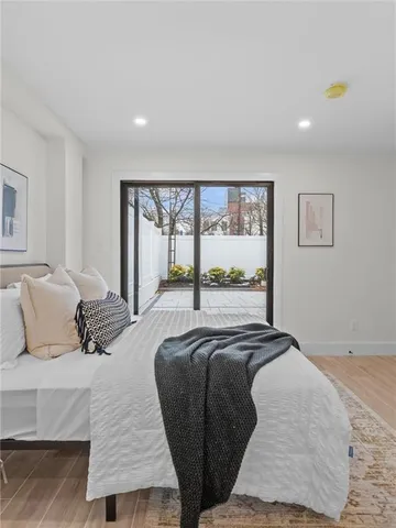 a bathroom with a toilet a sink and shower