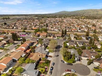 an aerial view of residential building with parking space