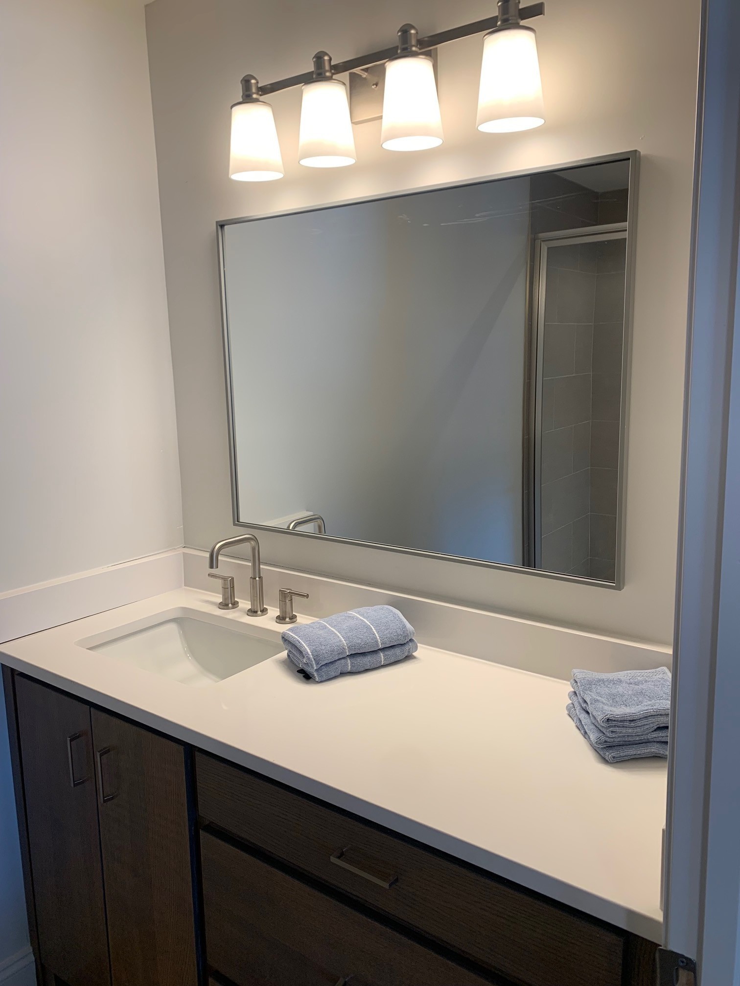 326 West Main Street Lebanon, TN 37087 - Photo 51 of 63 a bathroom with a sink and a mirror