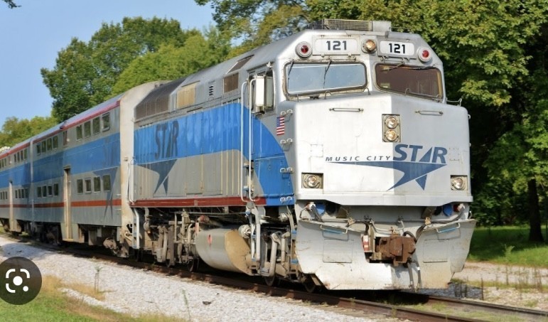 326 West Main Street Lebanon, TN 37087 - Photo 63 of 63 a car parked in front of a white building